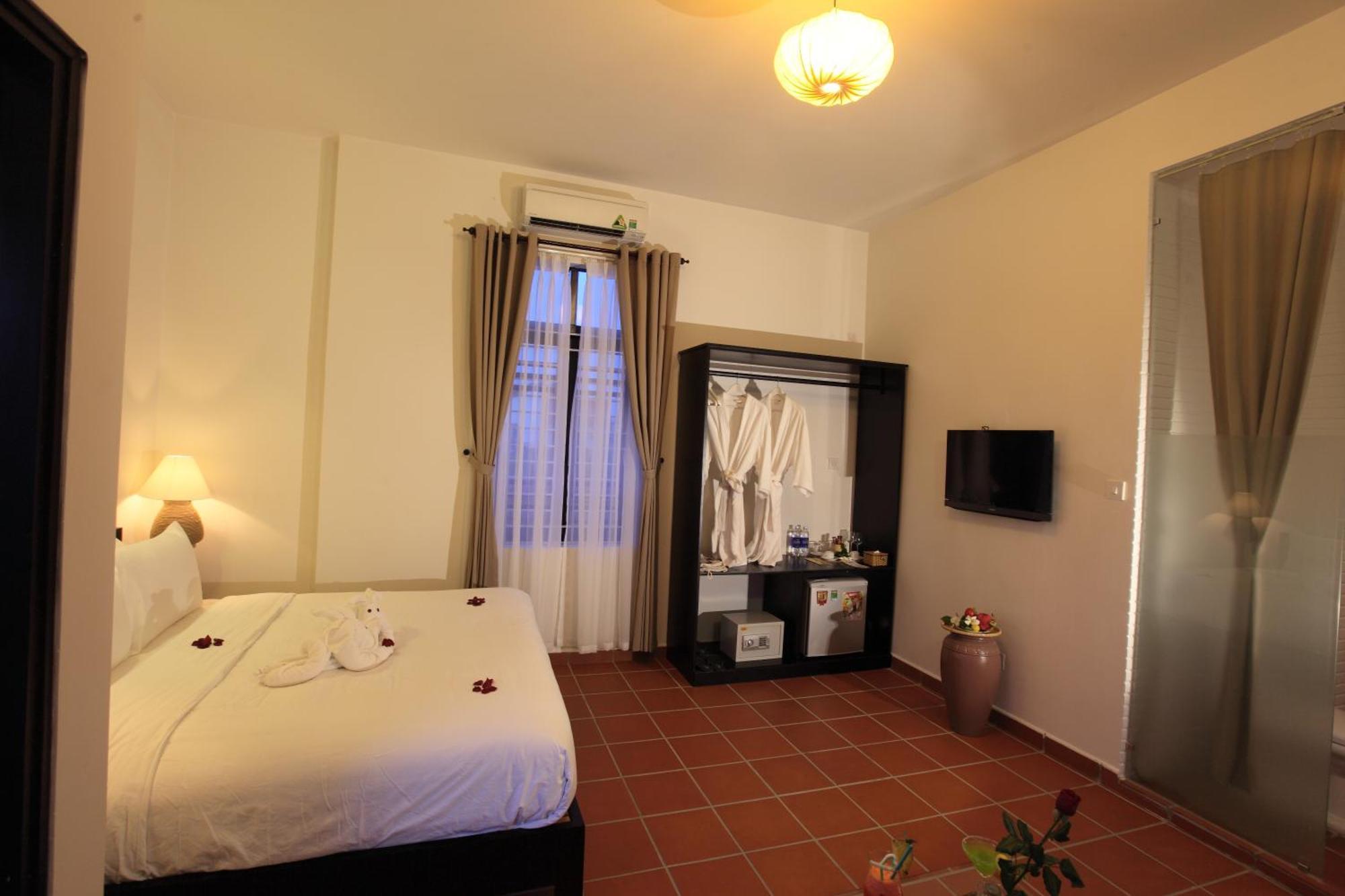 East West Villa Hoi An Quarto foto